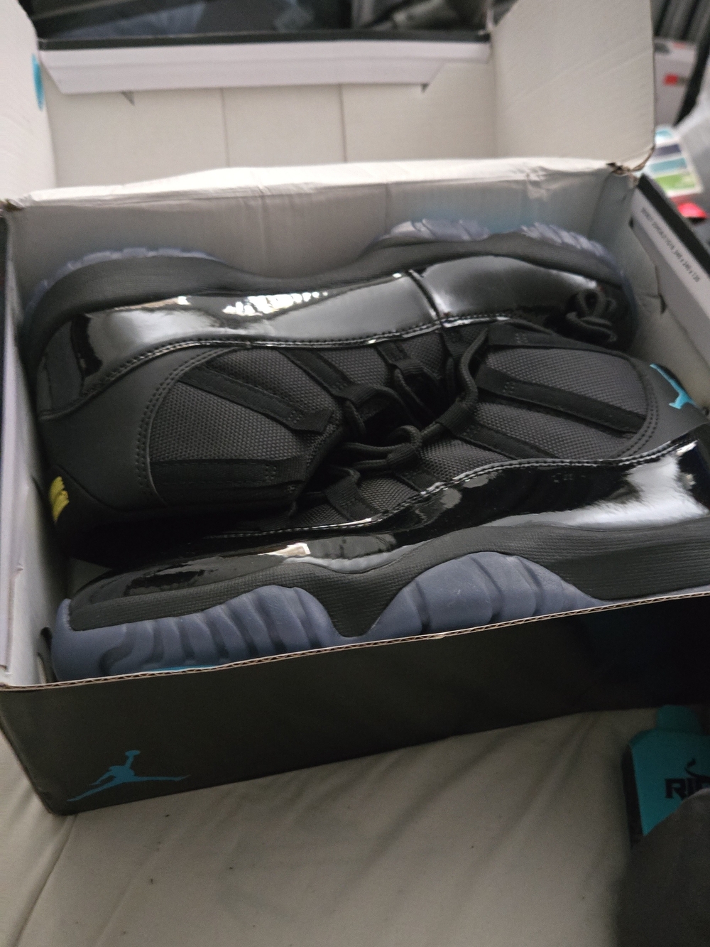 Jordan Men's Black Patent Leather Sneakers with Blue and Yellow Accents
